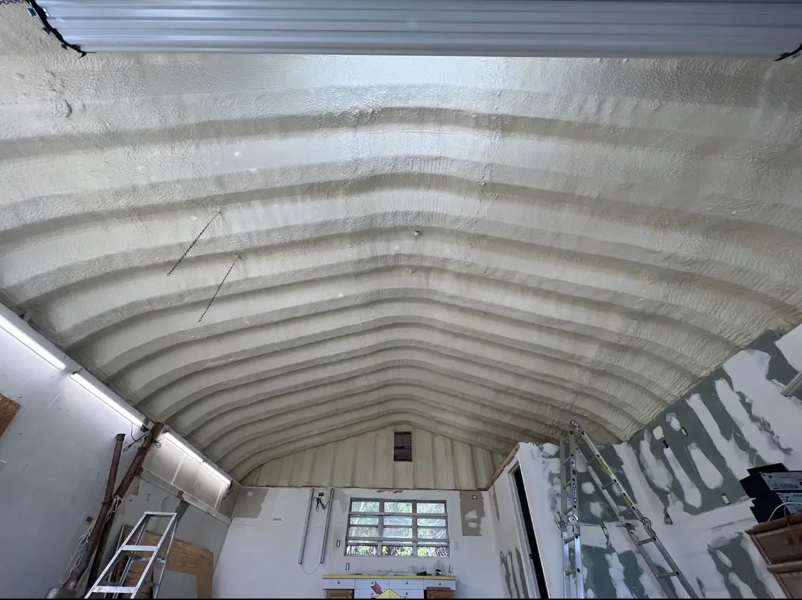 Spray polyurethane foam applied to the underside of a metal roof deck in Klamath Falls